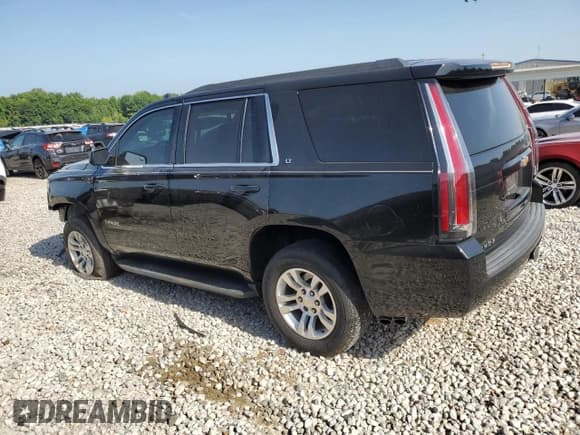 ✅ 2015 Chevrolet Tahoe LT • VIN: 1GNSKBKCXFR158606 • Lot: 65063315. Listed on Copart with 210,832 mi. Free auction sales archive from the USA and detailed vehicle history report at DreamBid. Image 2.