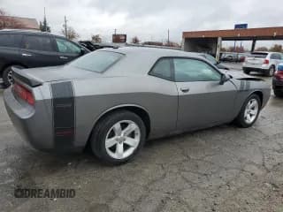 ✅ 2012 Dodge Challenger SXT • VIN: 2C3CDYAG3CH176525 • Lot: 80552134. Wystawiony na Copart z przebiegiem 127 916 mil. Bezpłatny archiwum sprzedaży aukcyjnych z USA i szczegółowy raport historii pojazdu na DreamBid. Zdjęcie 3.