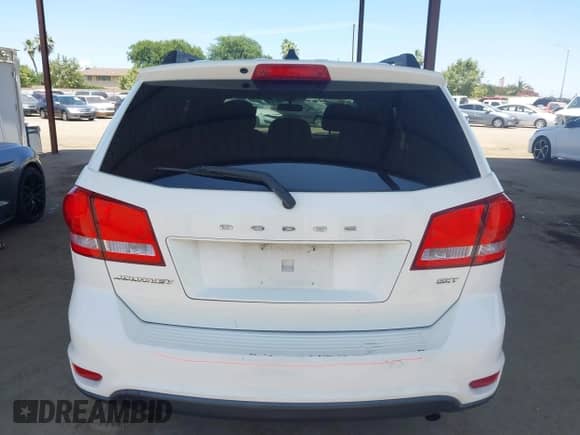 2015 Dodge Journey SXT z VIN 3C4PDCBB5FT568999, wystawiony jako IAAI lot #42527831 z przebiegiem 163 836 mil mil oraz . Historia ofert i sprzedaży dostępna na DreamBid. Obrazek 16.