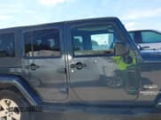 ✅ 2008 Jeep Wrangler Unlimited Sahara • VIN: 1J4GA59128L571725 • Lot: 43249920. Listed on IAAI with 185,270 mi. Free auction sales archive from the USA and detailed vehicle history report at DreamBid. Image 13.