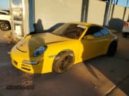 ✅ 2005 Porsche 911 Carrera 997 • VIN: WP0AA29935S715591 • Lot: 80885594. Wystawiony na Copart z przebiegiem 125 878 mil. Bezpłatny archiwum sprzedaży aukcyjnych z USA i szczegółowy raport historii pojazdu na DreamBid. Zdjęcie 1.