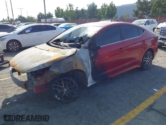 ✅ 2019 Hyundai Elantra Sport • VIN: KMHD04LB1KU860759 • Lot: 43603334. Listed on IAAI with Not provided. Free auction sales archive from the USA and detailed vehicle history report at DreamBid. Image 2.