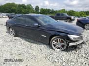 ✅ 2014 BMW 7 Series 740i • VIN: WBAYA6C57ED826660 • Lot: 59566945. Listed on Copart with 95,828 mi. Free auction sales archive from the USA and detailed vehicle history report at DreamBid. Image 4.