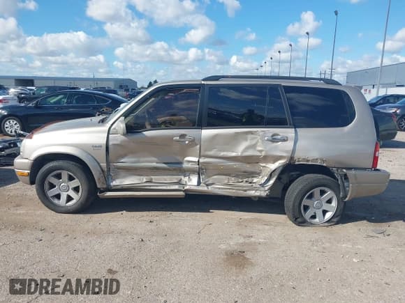 ✅ 2003 Suzuki XL7 Touring • VIN: JS3TX92V934102093 • Lot: 43710578. Listed on IAAI with 89,189 mi. Free auction sales archive from the USA and detailed vehicle history report at DreamBid. Image 14.