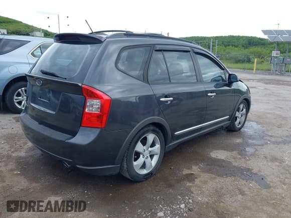 ✅ 2007 Kia Rondo EX • VIN: KNAFG526677080844 • Лот: 42242066. Опубликован ранее на IAAI с пробегом 163 936 миль. Бесплатный доступ к архиву аукционных продаж из США и подробный отчёт об истории автомобиля на DreamBid. Изображение 4.