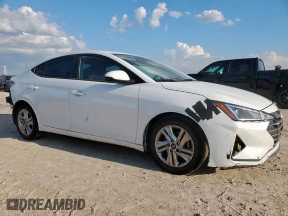 2020 Hyundai Elantra SEL с VIN 5NPD84LFXLH584139, выставлен на аукционе Copart как лот 71121325 с пробегом 104 714 миль миль и Списание • Salvage title. История ставок и продаж доступна на DreamBid. Изображение 4.