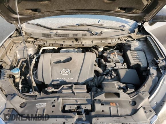 ✅ 2014 Mazda CX-5 Sport • VIN: JM3KE4BE6E0333179 • Lot: 72062995. Listed on Copart with 231,548 mi. Free auction sales archive from the USA and detailed vehicle history report at DreamBid. Image 12.