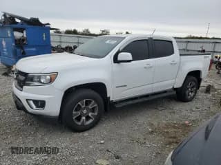 ✅ 2015 Chevrolet Colorado 4WD Z71 • VIN: 1GCGTCE31F1184572 • Лот: 74882534. Опубликован ранее на Copart с пробегом 126 698 миль. Бесплатный доступ к архиву аукционных продаж из США и подробный отчёт об истории автомобиля на DreamBid. Изображение 1.