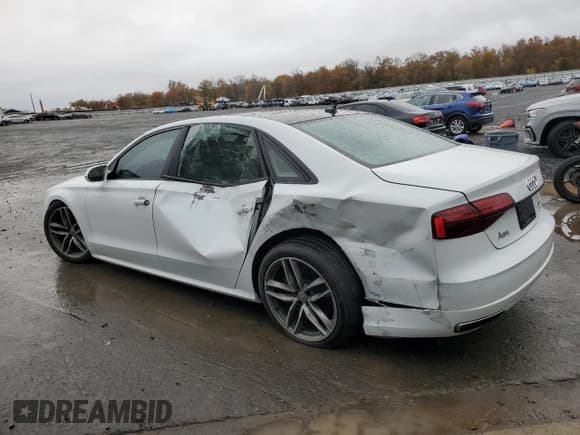 ✅ 2017 Audi A8 Sport • VIN: WAU43AFD4HN004010 • Lot: 86876745. Wystawiony na Copart z przebiegiem 118 261 mil. Bezpłatny archiwum sprzedaży aukcyjnych z USA i szczegółowy raport historii pojazdu na DreamBid. Zdjęcie 2.
