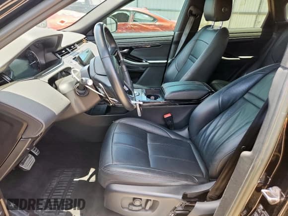 ✅ 2023 Land Rover Range Rover Evoque R-Dynamic S • VIN: SALZT2FX9PH199214 • Lot: 64382795. Listed on Copart with 65,743 mi. Free auction sales archive from the USA and detailed vehicle history report at DreamBid. Image 7.