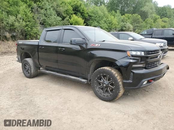 2021 Chevrolet Silverado 1500 LT Trail Boss with VIN 3GCPYFED9MG297616, listed as a Copart auction lot 60723505 with 95,175 mi miles and Salvage title. Bid and sale history available at DreamBid. Image 4.