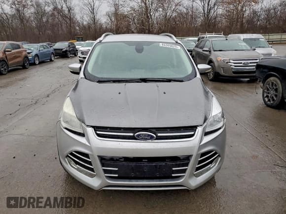 ✅ 2014 Ford Escape Titanium • VIN: 1FMCU9J91EUC42973 • Lot: 94269625. Wystawiony na Copart z przebiegiem 197 777 mil. Bezpłatny archiwum sprzedaży aukcyjnych z USA i szczegółowy raport historii pojazdu na DreamBid. Zdjęcie 5.