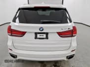 ✅ 2018 BMW X5 xDrive50i • VIN: 5UXKR6C50J0U15456 • Лот: 72103535. Опубликован ранее на Copart с пробегом 116 987 миль. Бесплатный доступ к архиву аукционных продаж из США и подробный отчёт об истории автомобиля на DreamBid. Изображение 6.