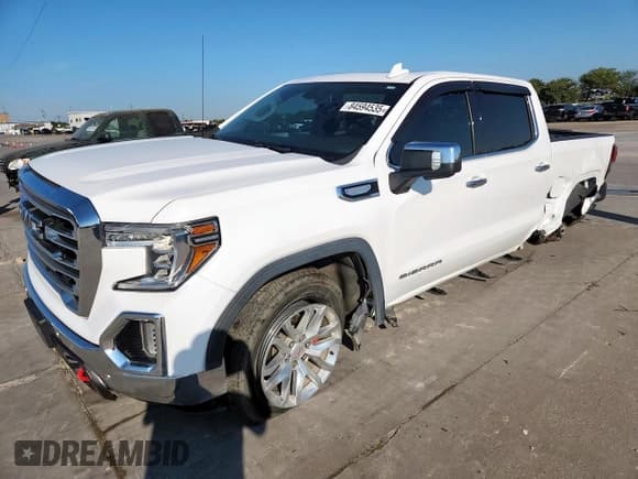 ✅ 2019 GMC Sierra 1500 SLT • VIN: 3GTP8DED7KG293646 • Лот: 84594535. Опубликован ранее на Copart с пробегом 98 507 миль. Бесплатный доступ к архиву аукционных продаж из США и подробный отчёт об истории автомобиля на DreamBid. Изображение 1.