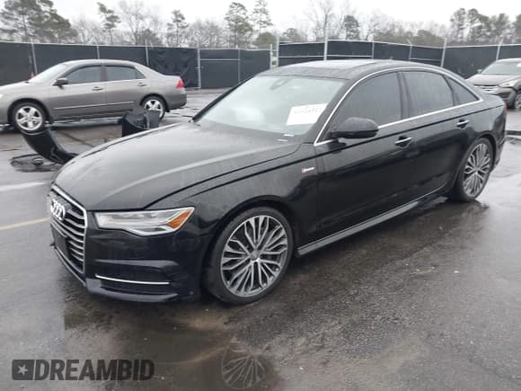 ✅ 2016 Audi A6 Prestige • VIN: WAUHGAFC9GN016715 • Lot: 41624521. Listed on IAAI with 139,402 mi. Free auction sales archive from the USA and detailed vehicle history report at DreamBid. Image 2.