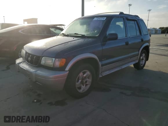 ✅ 1998 Kia Sportage • VIN: KNDJA7238W5579428 • Lot: 77242224. Wystawiony na Copart z przebiegiem 160 700 mil. Bezpłatny archiwum sprzedaży aukcyjnych z USA i szczegółowy raport historii pojazdu na DreamBid. Zdjęcie 1.