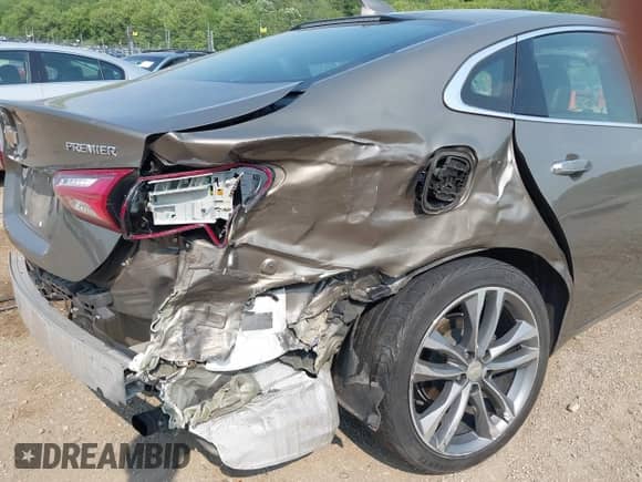 2020 Chevrolet Malibu Premier with VIN 1G1ZE5SX5LF051794, listed as a IAAI auction lot 42431059 with 55,784 mi miles and . Bid and sale history available at DreamBid. Image 6.