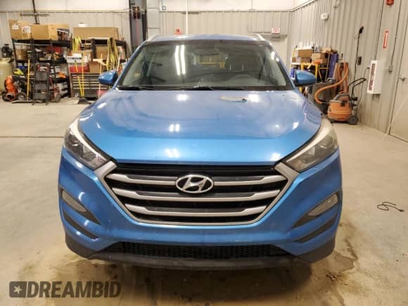 2018 Hyundai Tucson SEL with VIN KM8J3CA44JU614683, listed as a Copart auction lot 69869295 with Not provided miles and Salvage title. Bid and sale history available at DreamBid. Image 5.