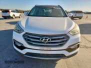 ✅ 2017 Hyundai Santa Fe 2.4L • VIN: 5XYZU3LB8HG410979 • Lot: 90727745. Wystawiony na Copart z przebiegiem 89 970 mil. Bezpłatny archiwum sprzedaży aukcyjnych z USA i szczegółowy raport historii pojazdu na DreamBid. Zdjęcie 5.