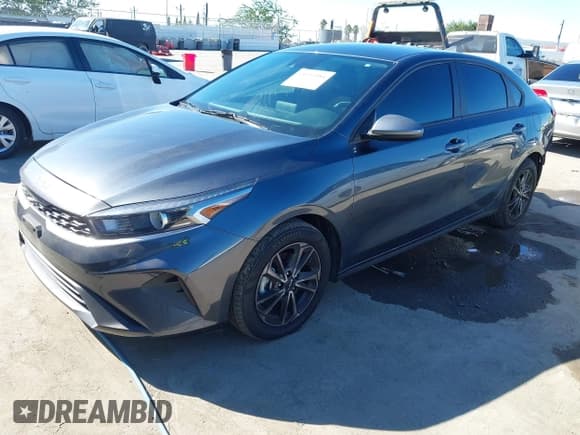 ✅ 2023 Kia Forte LXS • VIN: 3KPF24AD6PE652054 • Lot: 43551984. Listed on IAAI with 22,074 mi. Free auction sales archive from the USA and detailed vehicle history report at DreamBid. Image 2.