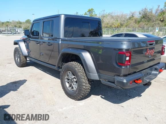 ✅ 2024 Jeep Gladiator Mojave X • VIN: 1C6JJTEGXRL123199 • Lot: 41683087. Listed on IAAI with 7,326 mi. Free auction sales archive from the USA and detailed vehicle history report at DreamBid. Image 3.