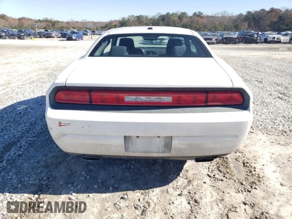 ✅ 2014 Dodge Challenger SXT • VIN: 2C3CDYAG9EH277054 • Lot: 84704754. Wystawiony na Copart z przebiegiem 211 391 mil. Bezpłatny archiwum sprzedaży aukcyjnych z USA i szczegółowy raport historii pojazdu na DreamBid. Zdjęcie 6.