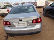 ✅ 2009 Volkswagen Jetta S • VIN: 3VWJM71KX9M097779 • Lot: 43749490. Listed on IAAI with 75,266 mi. Free auction sales archive from the USA and detailed vehicle history report at DreamBid. Image 16.