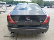 ✅ 2015 Jaguar XJ • VIN: SAJWJ1CD9F8V83885 • Lot: 58016335. Listed on Copart with 81,794 mi. Free auction sales archive from the USA and detailed vehicle history report at DreamBid. Image 6.