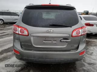 ✅ 2012 Hyundai Santa Fe SE • VIN: 5XYZHDAG8CG122087 • Lot: 87845555. Listed on Copart with Not provided. Free auction sales archive from the USA and detailed vehicle history report at DreamBid. Image 6.