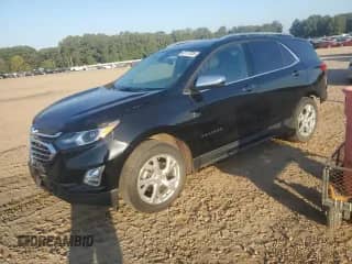 2018 Chevrolet Equinox Premier с VIN 2GNAXVEV0J6224340, выставлен на аукционе Copart как лот 82177225 с пробегом 191 353 миль миль и Списание • Salvage title. История ставок и продаж доступна на DreamBid. Изображение 1.