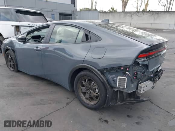 2024 Toyota Prius LE with VIN JTDACAAU6R3046057, listed as a IAAI auction lot 43316816 with 14,220 mi miles and . Bid and sale history available at DreamBid. Image 3.