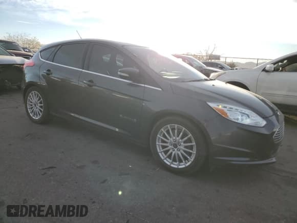 ✅ 2015 Ford Focus Electric • VIN: 1FADP3R40FL348785 • Lot: 84516374. Listed on Copart with 85,633 mi. Free auction sales archive from the USA and detailed vehicle history report at DreamBid. Image 4.