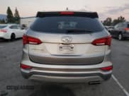 ✅ 2018 Hyundai Santa Fe 2.4L • VIN: 5NMZU3LB0JH056211 • Lot: 93690255. Listed on Copart with 75,202 mi. Free auction sales archive from the USA and detailed vehicle history report at DreamBid. Image 6.