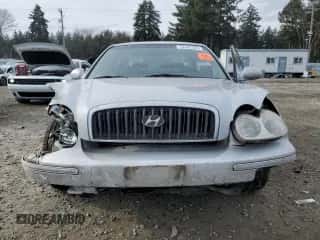 2003 Hyundai Sonata с VIN KMHWF25S03A881792, выставлен на аукционе Copart как лот 43432105 с пробегом 135 706 миль миль и Списание • Salvage title. История ставок и продаж доступна на DreamBid. Изображение 5.