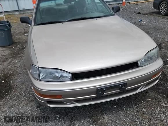 ✅ 1993 Toyota Camry DLX • VIN: 4T1SK11E6PU180747 • Lot: 64990075. Wystawiony na Copart z przebiegiem 109 692 mil. Bezpłatny archiwum sprzedaży aukcyjnych z USA i szczegółowy raport historii pojazdu na DreamBid. Zdjęcie 13.