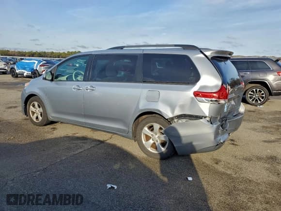 ✅ 2014 Toyota Sienna LE • VIN: 5TDKK3DC3ES418436 • Lot: 94766755. Listed on Copart with 179,407 mi. Free auction sales archive from the USA and detailed vehicle history report at DreamBid. Image 2.