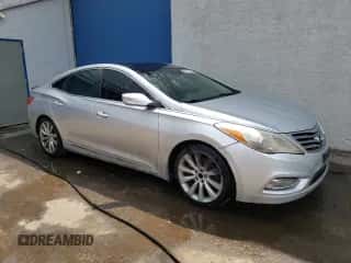2012 Hyundai Azera z VIN KMHFH4JG3CA192496, wystawiony jako Copart lot #64794034 z przebiegiem 130 211 mil mil oraz Czysty tytuł • Clean title. Historia ofert i sprzedaży dostępna na DreamBid. Obrazek 4.