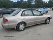 ✅ 1999 Toyota Corolla LE • VIN: 1NXBR12E6XZ148570 • Лот: 81554415. Опубликован ранее на Copart с пробегом 264 960 миль. Бесплатный доступ к архиву аукционных продаж из США и подробный отчёт об истории автомобиля на DreamBid. Изображение 3.