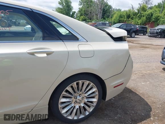 ✅ 2014 Lincoln MKZ • VIN: 3LN6L2G92ER814476 • Lot: 42768605. Listed on IAAI with 76,122 mi. Free auction sales archive from the USA and detailed vehicle history report at DreamBid. Image 6.