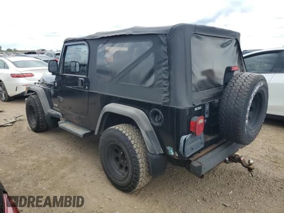 ✅ 2005 Jeep Wrangler Unlimited • VIN: 1J4FA44S25P335120 • Lot: 70306025. Listed on Copart with 137,315 mi. Free auction sales archive from the USA and detailed vehicle history report at DreamBid. Image 2.