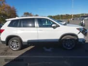 ✅ 2023 Honda Passport EX-L • VIN: 5FNYF8H53PB014146 • Lot: 43469474. Listed on IAAI with 32,713 mi. Free auction sales archive from the USA and detailed vehicle history report at DreamBid. Image 13.