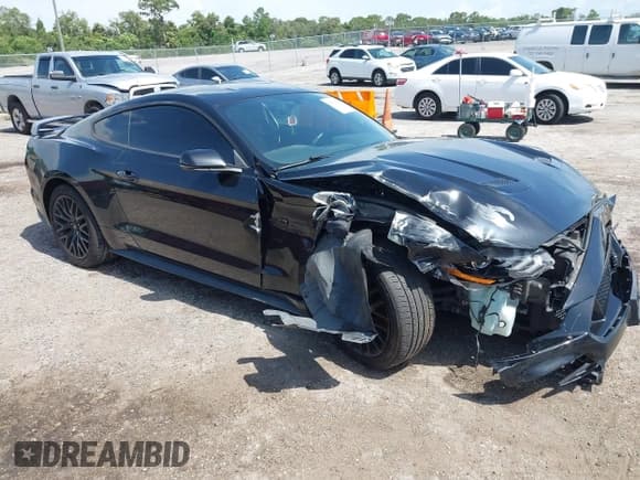 ✅ 2020 Ford Mustang GT • VIN: 1FA6P8CF3L5124264 • Lot: 42735508. Listed on IAAI with 69,816 mi. Free auction sales archive from the USA and detailed vehicle history report at DreamBid. Image 1.