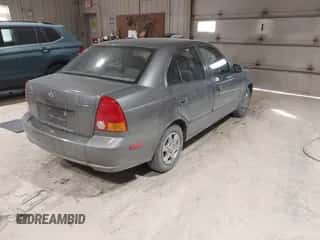2004 Hyundai Accent GL with VIN KMHCG45C44U528783, listed as a IAAI auction lot 41535104 with Not provided miles and . Bid and sale history available at DreamBid. Image 4.