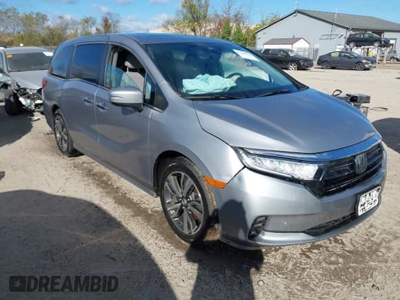 ✅ 2021 Honda Odyssey Touring • VIN: 5FNRL6H85MB042750 • Lot: 43439314. Listed on IAAI with 97,703 mi. Free auction sales archive from the USA and detailed vehicle history report at DreamBid. Image 1.