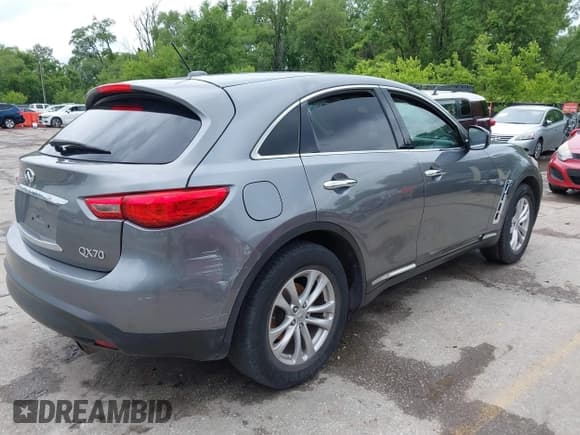 ✅ 2017 Infiniti QX70 • VIN: JN8CS1MU4HM141785 • Lot: 42345827. Listed on IAAI with 123,947 mi. Free auction sales archive from the USA and detailed vehicle history report at DreamBid. Image 4.