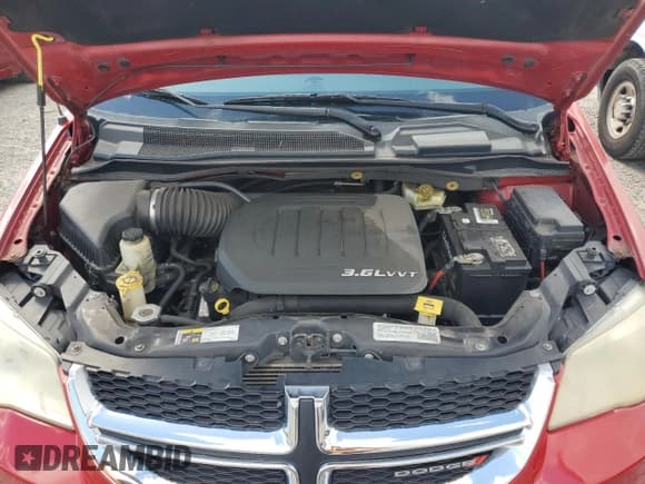 ✅ 2014 Dodge Grand Caravan SE • VIN: 2C4RDGBG2ER362939 • Lot: 81885585. Listed on Copart with 155,871 mi. Free auction sales archive from the USA and detailed vehicle history report at DreamBid. Image 12.