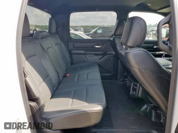 2023 Ram 1500 Tradesman z VIN 1C6RRENTXPN573635, wystawiony jako Copart lot #70497975 z przebiegiem 64 595 mil mil oraz Szkoda całkowita • Salvage title. Historia ofert i sprzedaży dostępna na DreamBid. Obrazek 10.