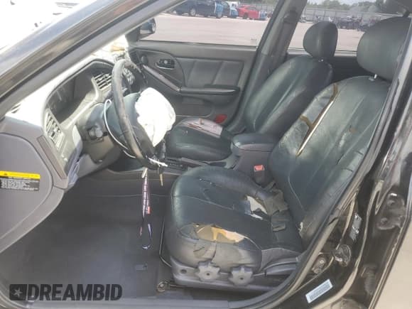 ✅ 2003 Hyundai Elantra GLS • VIN: KMHDN45D03U500898 • Lot: 61473825. Wystawiony na Copart z przebiegiem 127 252 mil. Bezpłatny archiwum sprzedaży aukcyjnych z USA i szczegółowy raport historii pojazdu na DreamBid. Zdjęcie 7.