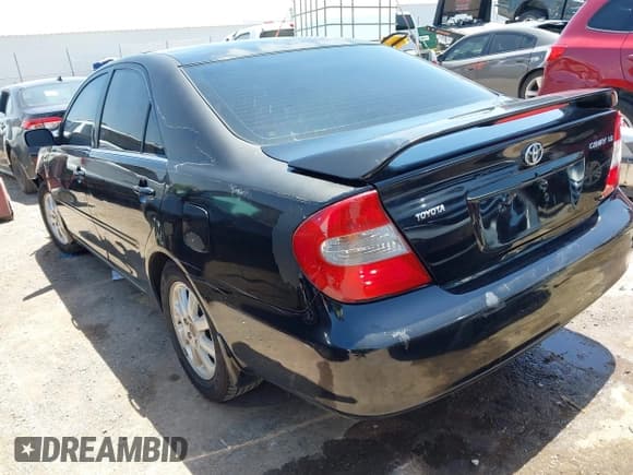 ✅ 2004 Toyota Camry LE • VIN: 4T1BE32K74U338807 • Lot: 42807182. Listed on IAAI with 194,463 mi. Free auction sales archive from the USA and detailed vehicle history report at DreamBid. Image 15.