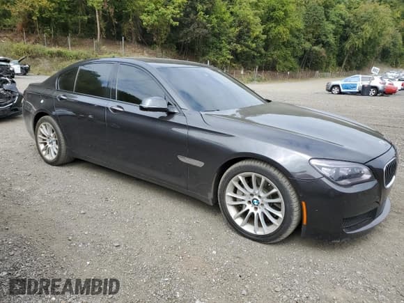 ✅ 2015 BMW 7 Series 750i xDrive • VIN: WBAYB6C59FG299220 • Lot: 81751525. Listed on Copart with 162,075 mi. Free auction sales archive from the USA and detailed vehicle history report at DreamBid. Image 4.
